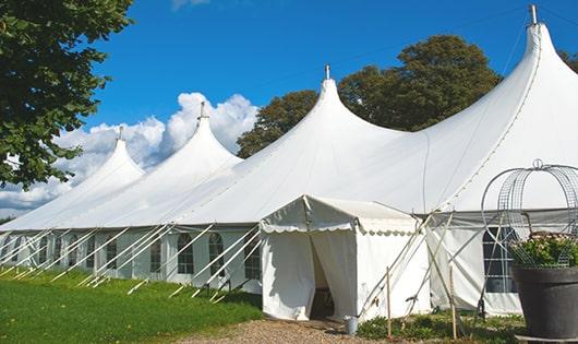 high-quality portable toilets stationed at a wedding, meeting the needs of guests throughout the outdoor reception in Placida